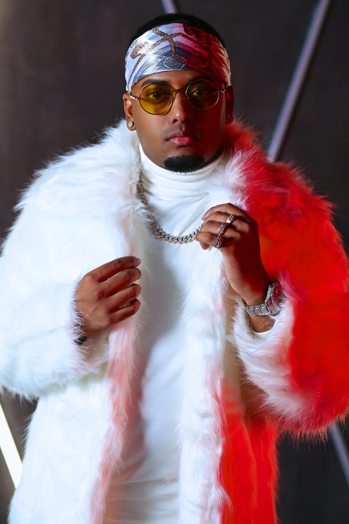 DJ SpinKing portrait in white and red fur